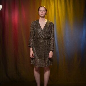 Gold/black shimmering short dress. Size Small, V cut in the front